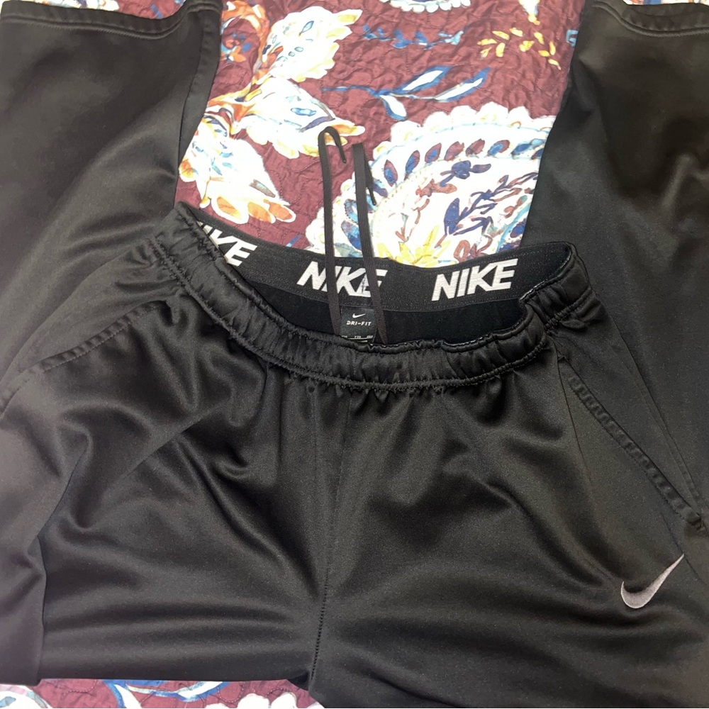 Men’s Nike Dri Fit sweatpants.